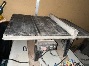 lot 52 image: Craftsman and Skilsaw Table Saw with Adjustable Fence