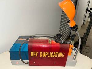 lot 200 image: Vintage Key Duplicating Machine with Integrated Light