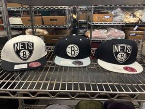 lot 214 image: Collection of 3 Mitchell & Ness Brooklyn Nets Snapback Caps