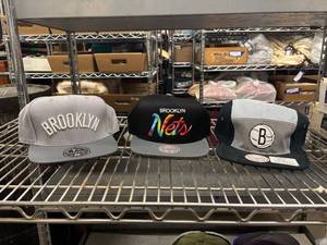 lot 215 image: Collection of 3 Brooklyn Nets Adjustable Snapback Hats New with Tags