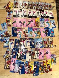 lot 247 image: Collection of 50 Themed House Keys featuring Disney and Rock Music Designs