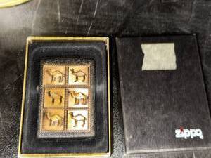lot 177A image: Zippo Lighter with Brass Camel Designs in Original Box