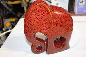 lot 3 image: Red Glazed Ceramic Elephant Sculpture