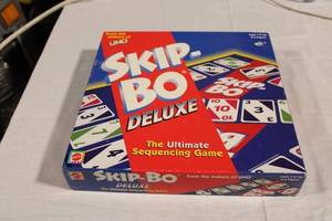 lot 7 image: Skip-Bo Deluxe Board Game with Cards and Score Pad
