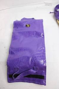 lot 31 image: Purple Joy Mangano Travel Organizer Roll-Up Bag