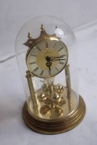 lot A-47 image: Junghans Rotating Pendulum Anniversary Clock