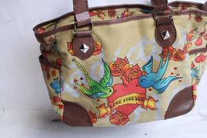 lot 64 image: Vintage Love Forever Canvas and Leather Handbag