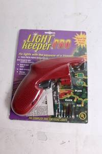 lot 67 image: Light Keeper Pro Tool for Fixing Christmas Lights