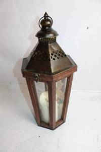 lot 104 image: Rustic Metal Lantern with Candle Holder