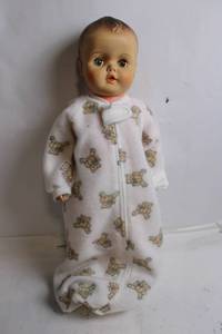 lot 112 image: Vintage Baby Doll in Teddy Bear Pajamas