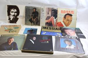 lot 187 image: Collection of 11 Vintage Vinyl Records Featuring Tom Jones, Nat King Cole, and More