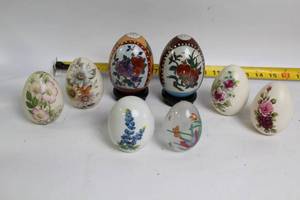 lot 208 image: Set of 9 Decorative Porcelain and Glass Eggs Featuring Floral Designs