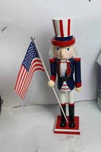 lot 292 image: Patriotic Uncle Sam Nutcracker with American Flag