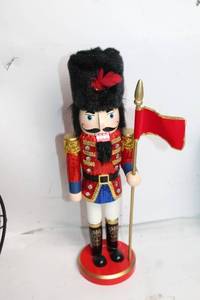 lot 294 image: Decorative Nutcracker Soldier with Red Flag