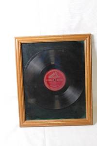 lot 79 image: Framed Vintage Victrola Record - Earle Crome & Emilio Scofano