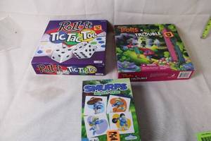 lot 190 image: Set of 3 Board Games Tic Tac Toe, Trolls in Trouble, Smurfs Memory Game