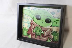 lot 210 image: Set of 2 Baby Yoda Shadow Box Art Pieces