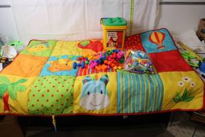 lot 217 image: Colorful Baby Play Mat with Discovery Toys Set