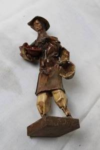 lot 223 image: Handcrafted Rustic Figurine of a Farmer Woman with Basket