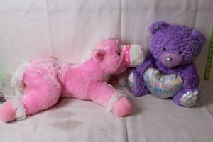 lot 225 image: Plush Pink Horse and Purple Teddy Bear with Heart Pillow Set