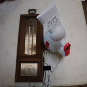 lot 147 image: 2 other things... something to make steam
