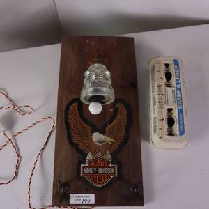 lot 194 image: HARLEY ILLUMINATABLE SIGN  WITH VINTAGE INSULATOR