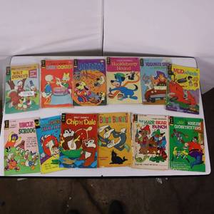 lot 202 image: LARGE LOT OF 12 TOTAL CARTOON COMICS