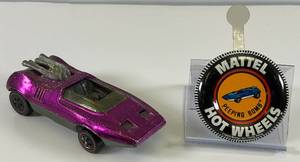 lot 103 image: 1969 REDLINE Hot Wheels Peeping Bomb Transparent Purple With Button Nice Condition
