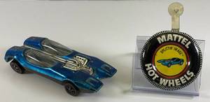lot 153 image: 1969 REDLINE Hot Wheels Splittin Image Transparent Blue With Button Nice Condition