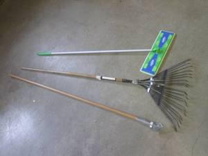 lot 103 image: (BR2) Swiffer Mop, Yard Rake and Mo...