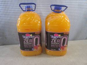 lot 142 image: (C-3) 2 - 1 Gallon Bottles Mango Pu...