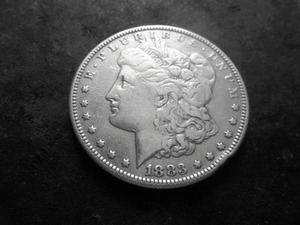 lot 26 image: 1883 S Morgan Silver Dollar