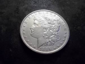 lot 28 image: 1886 Morgan Silver Dollar