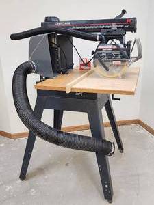lot 58 image: Craftsman 10 Radial Arm Saw on a Rolling Stand