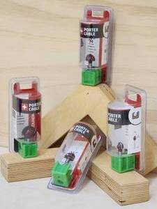 lot 13 image: (4) Assorted Porter Cable Router Bits