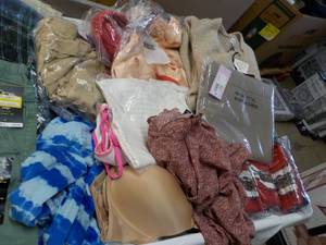 lot 112 image: 25 or so New Clothing From a major ...