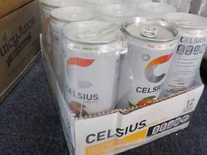 lot 61 image: 12 pack Celsius Non-Carbonated Peac...