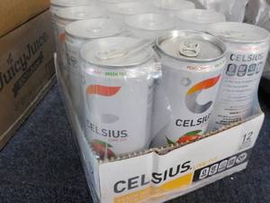 lot 62 image: 12 pack Celsius Non-Carbonated Peac...