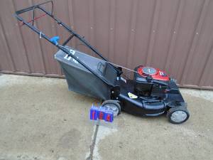 lot 104 image: Craftsman 6.75 self propelled mower with bag. Good condition. Tested & works. As shown.