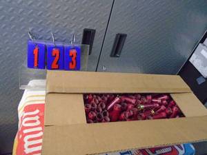 lot 123 image: Box of 12 gauge Paper shell to reload. Approx 200. As shown.