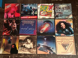 lot 112 image: Super Record Albums by Madonna, Stray Cats, Bob Seger, Kenny Loggins and More