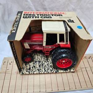 lot 52 image: Ertl 1856 International wcab, as New in Box