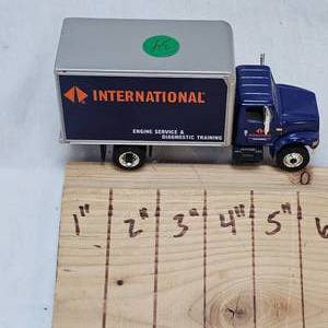 lot 34 image: International Engine Service Box Delivery Truck