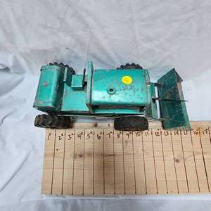 lot 99 image: Stucto End Loader 1950s Era