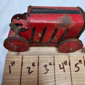 lot 102 image: 1930s Marx Midget Wind Up Hill Climbing Tractor