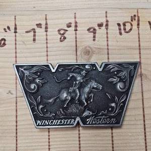 lot 62 image: 1977 Limited Edition WinchesterWestern Belt Buckles