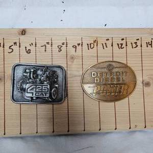 lot 68 image: Detroit Diesel and Cat 425 Buckles