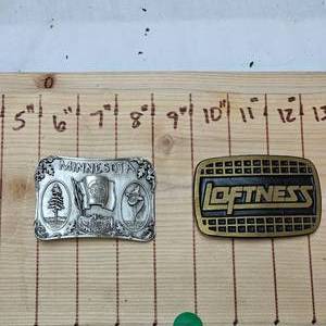 lot 69 image: Loftness and 1985 Minnesota Belt Buckles