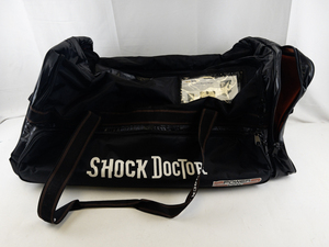 lot 21 image: SHOCK DOCTOR Coach Duffle Hocky Wheelie Bag.