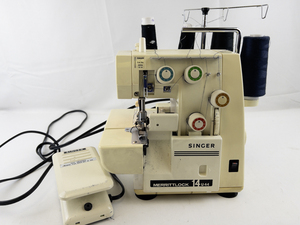 lot 84 image: Vintage SINGER Merritlock 14U44 Serger Sewing Machine. -Working.
